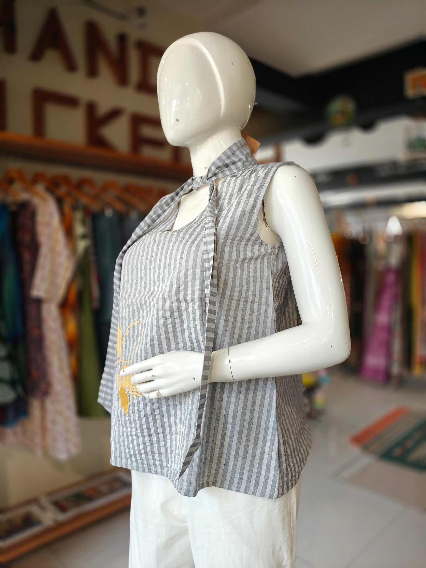 Grey striped and embroidered cotton top with tie up neck