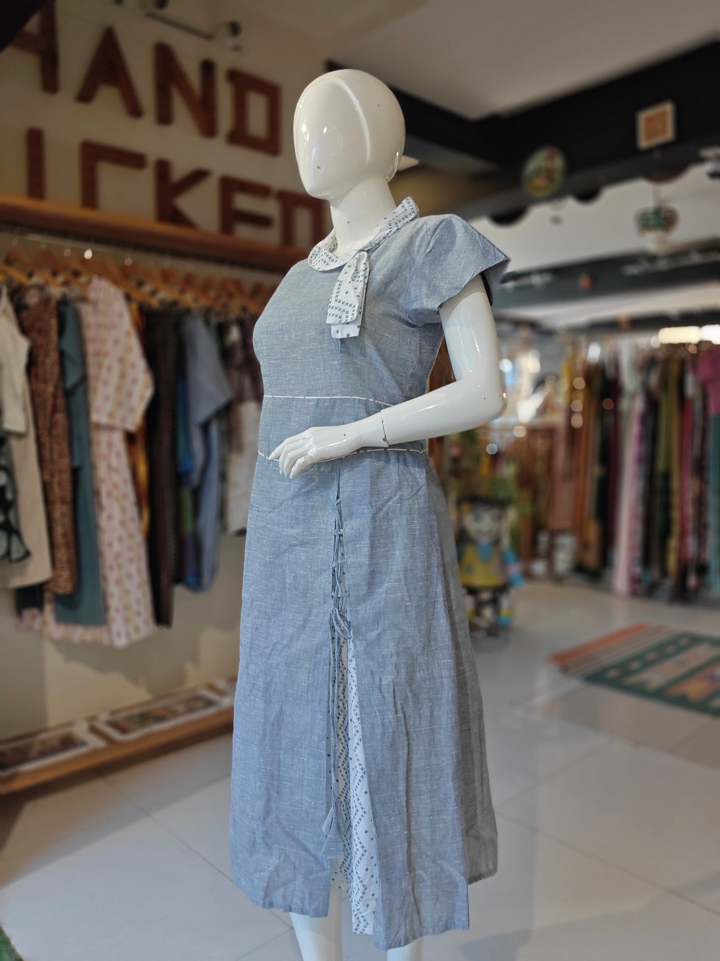 Retro look dress in indigo handwoven cotton with white polka dots collar