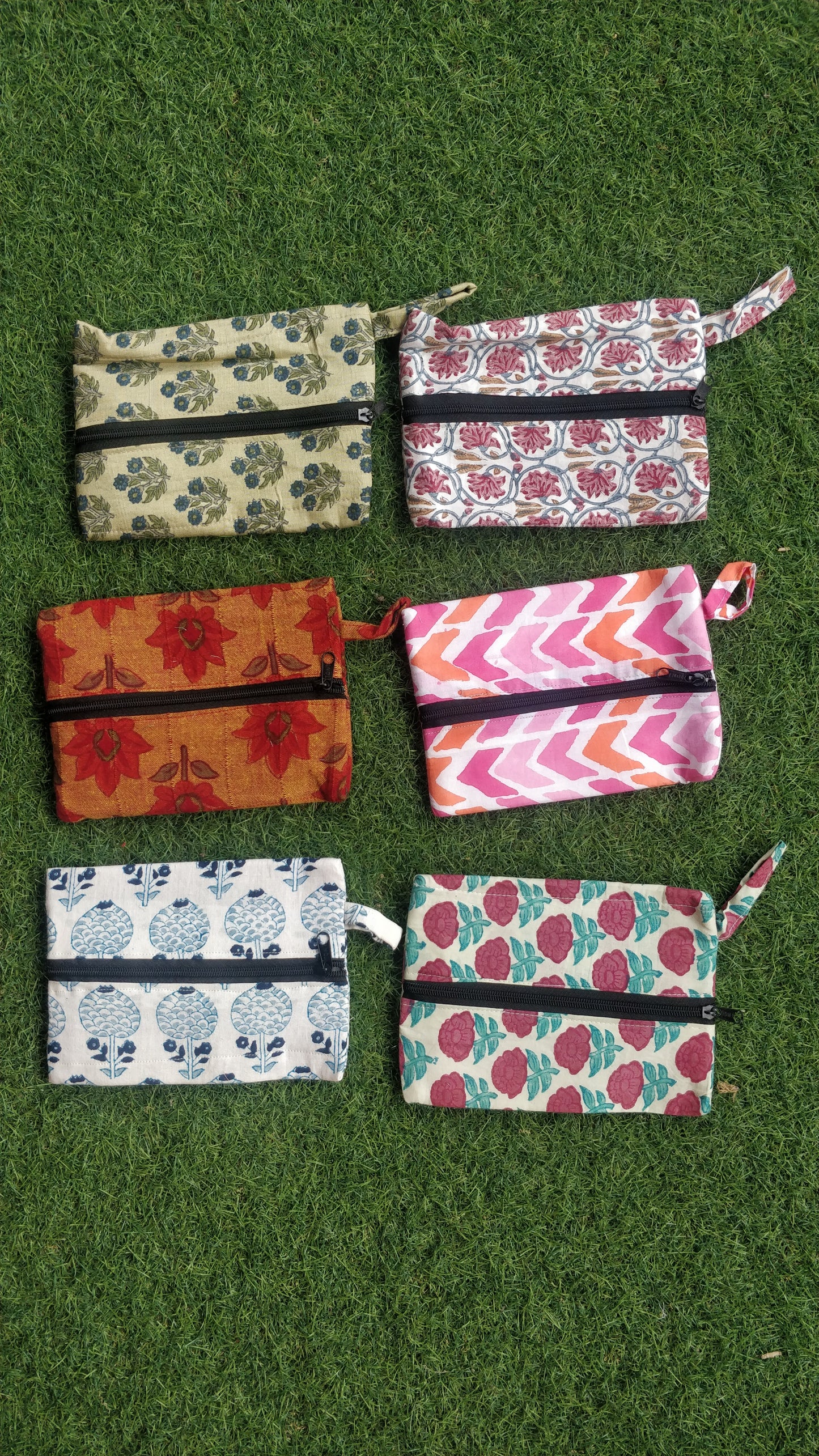 Multi purpose pouch with center zip