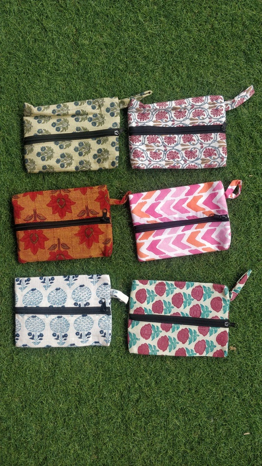 Multi purpose pouch with center zip