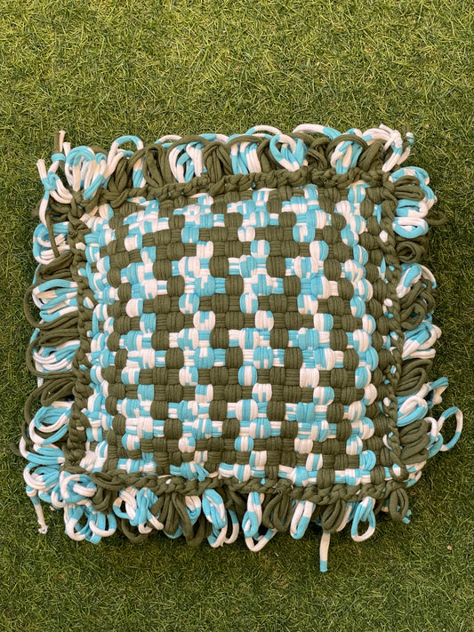 Green, blue and white handwoven upcycled knitted cotton cushion