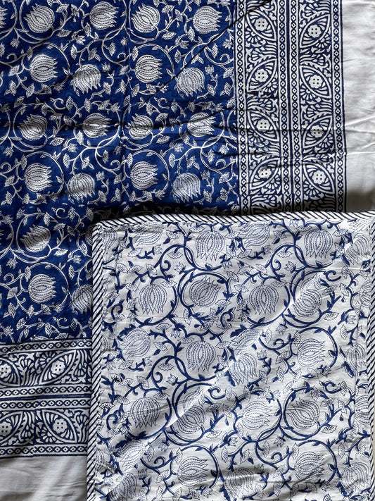 Blue and white floral hand block printed single reversible comforter