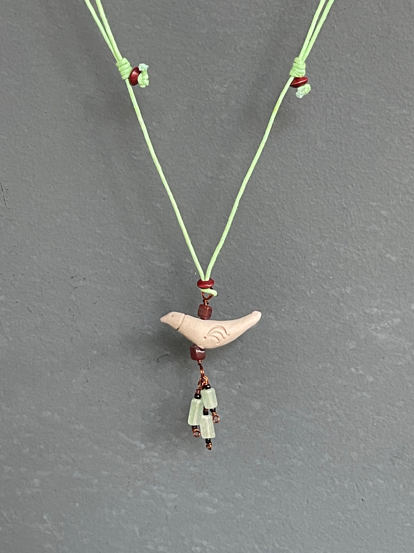 Terracotta bird pendant neckpiece - green