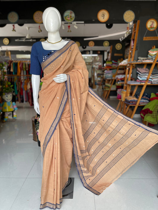 Earthy tone handloom cotton saree with small butis and indigo border