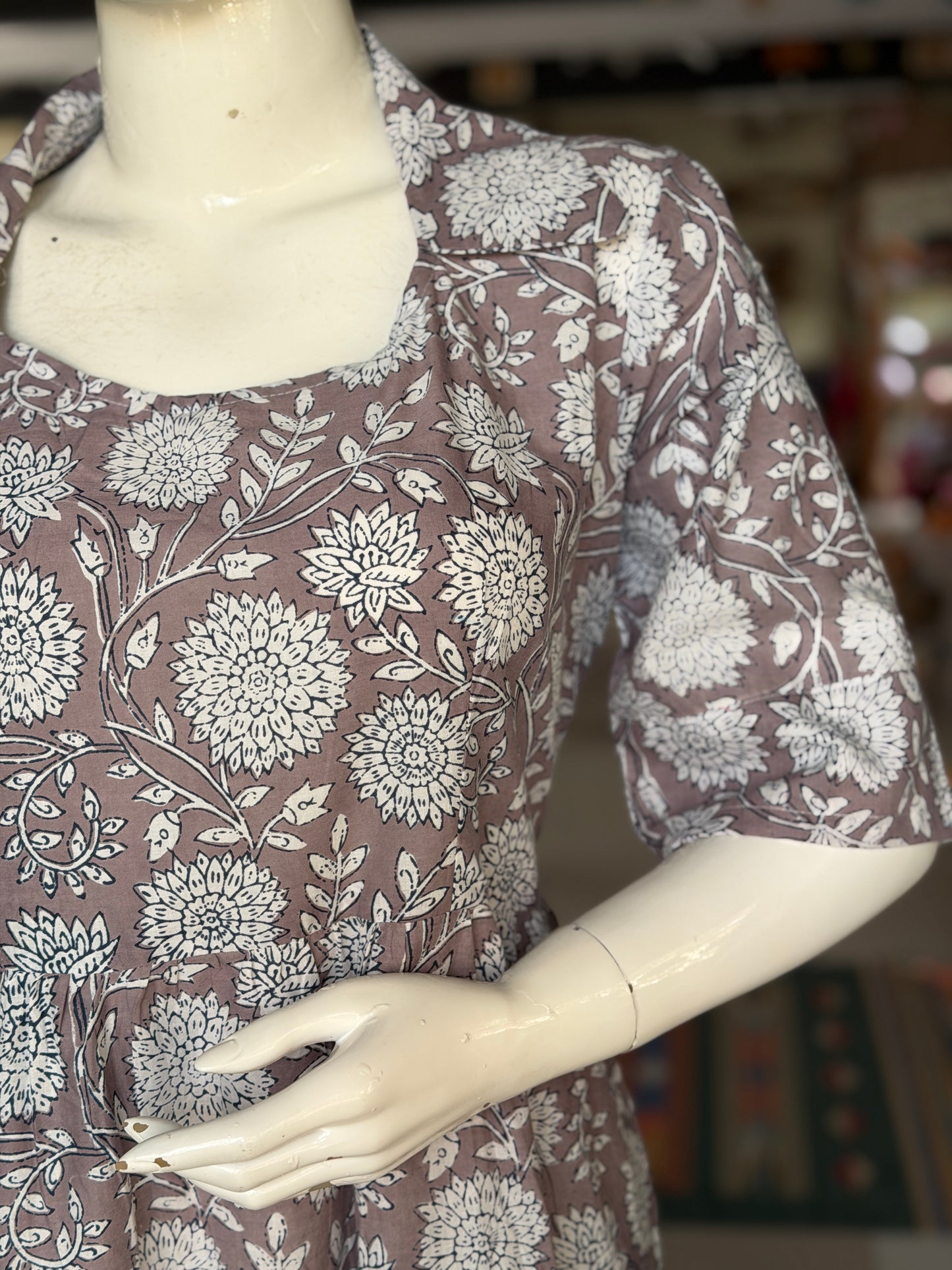 Brownish grey hand block printed cotton multi tiered dress with collared neck