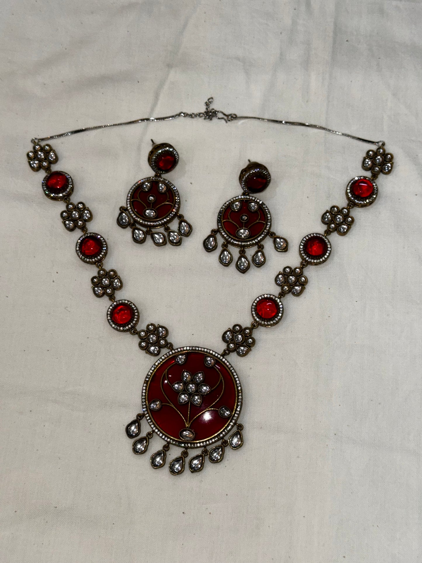 Red moissanite polki with pachi work heavy look neckpiece earrings set