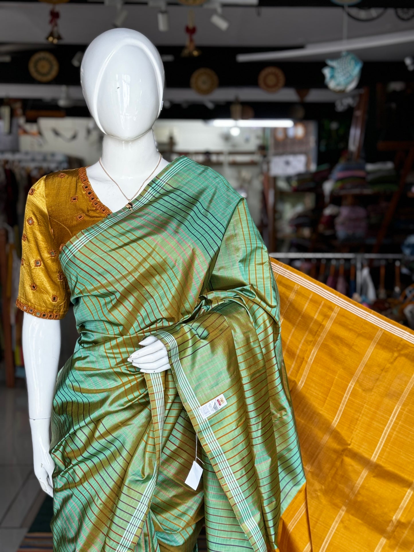 Green pure silk handloom kanjeevaram pattu saree with multi colored stripes all over