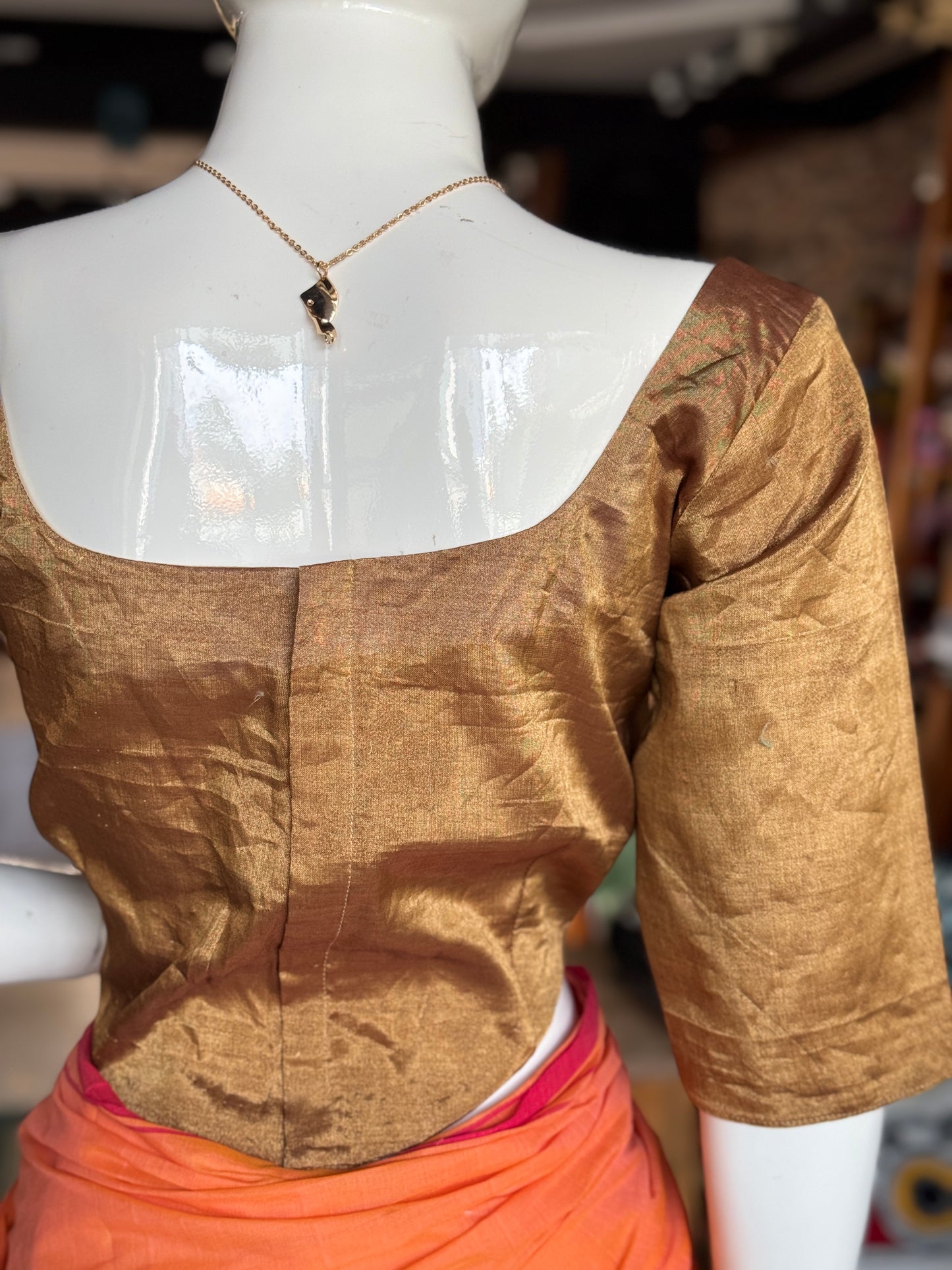 Gold tissue silk Chanderi handloom blouse with wide neck line, waist curve line and sleeves