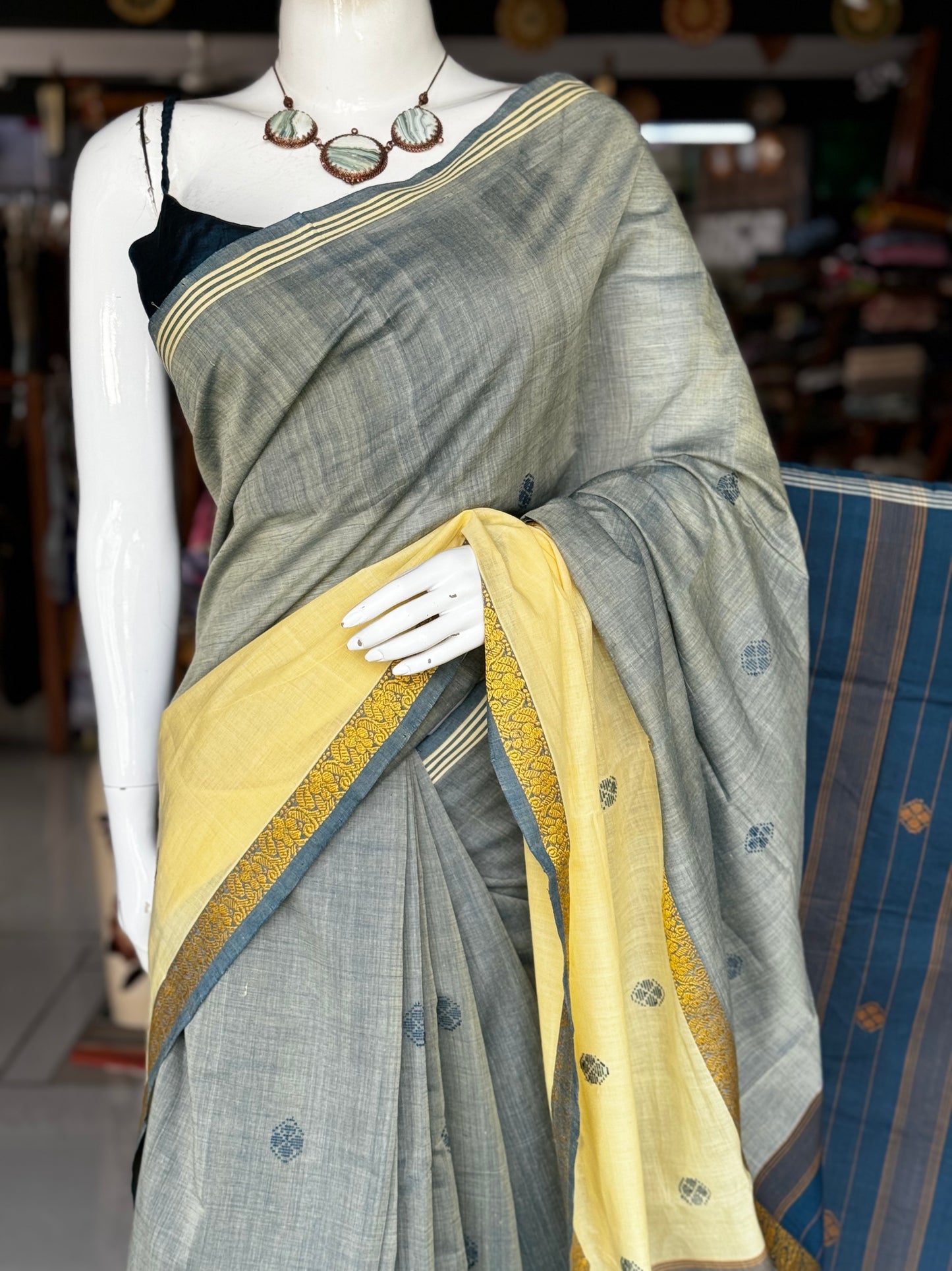 Grey and yellow pure soft cotton handloom saree with butis and double border