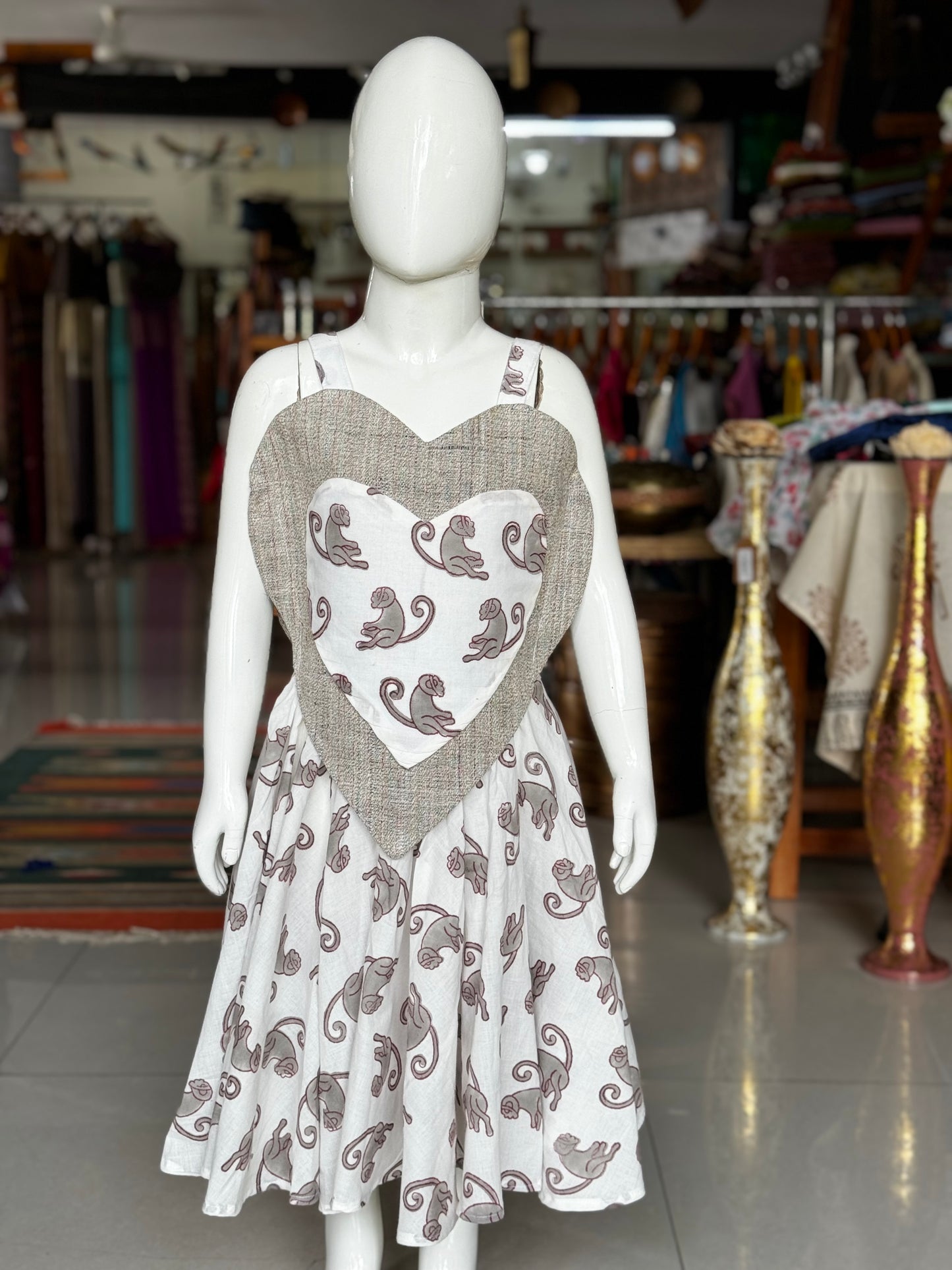 White monkeys hand block printed flared umbrella designer frock with handwoven grey heart yoke