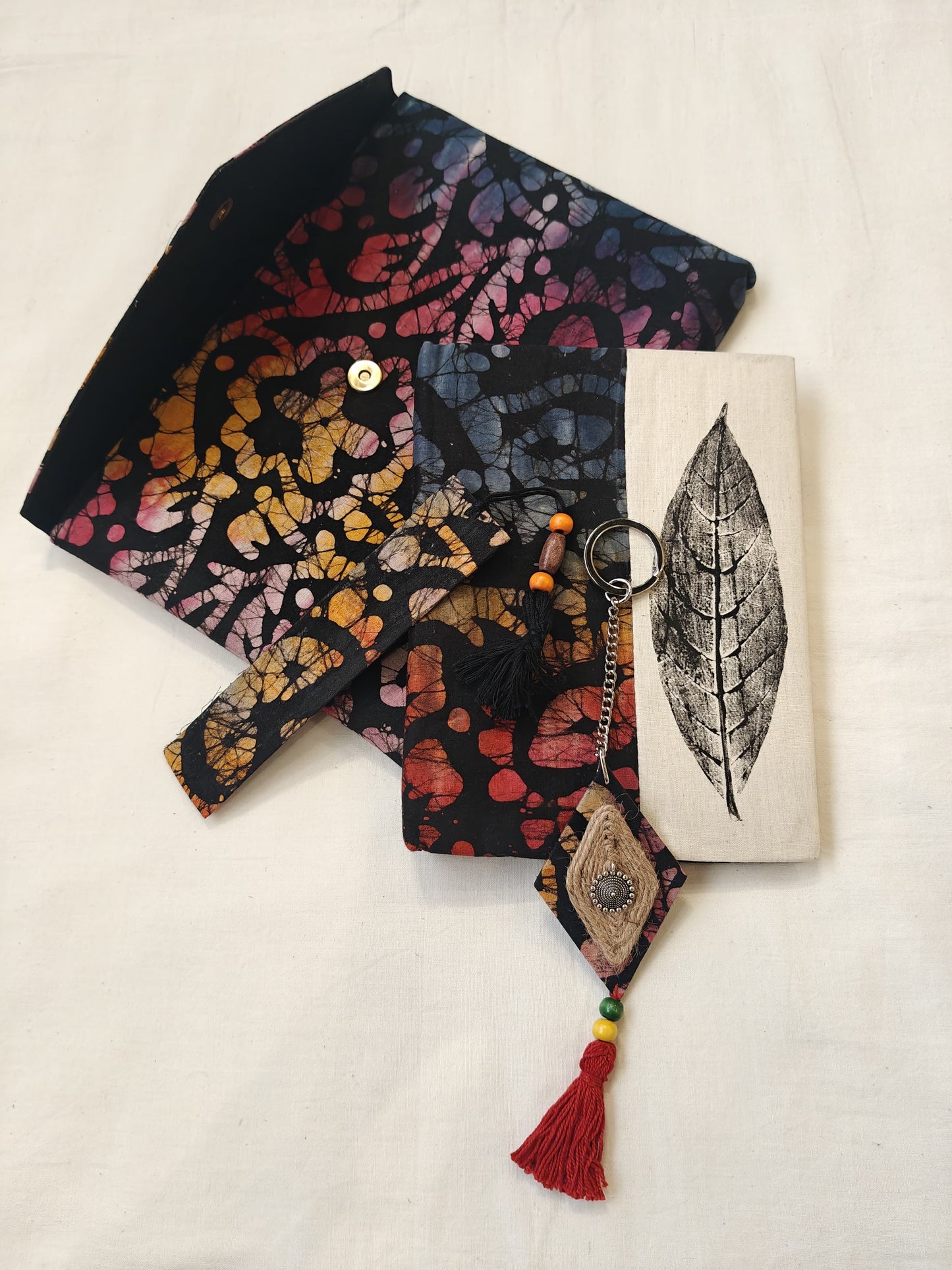 Handmade paper notebook with eco leaf printed fabric cover, hand crafted bookmark, key ring / charm and a container pouch set