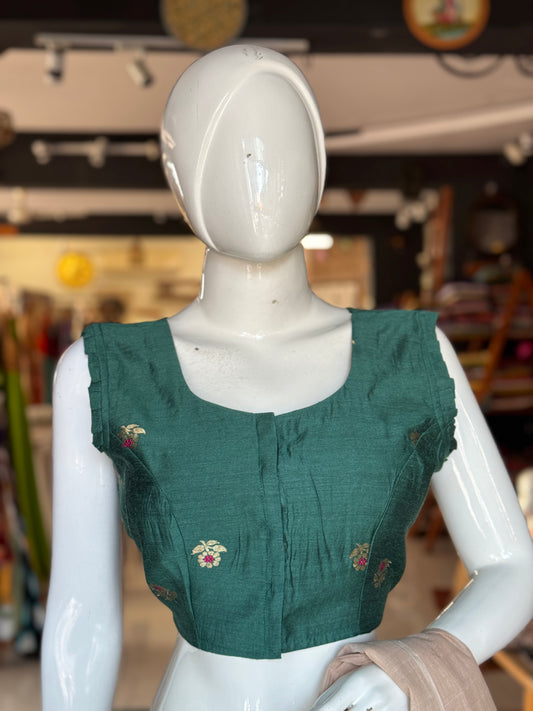 Teal green moonga silk handwoven blouse with floral motifs
