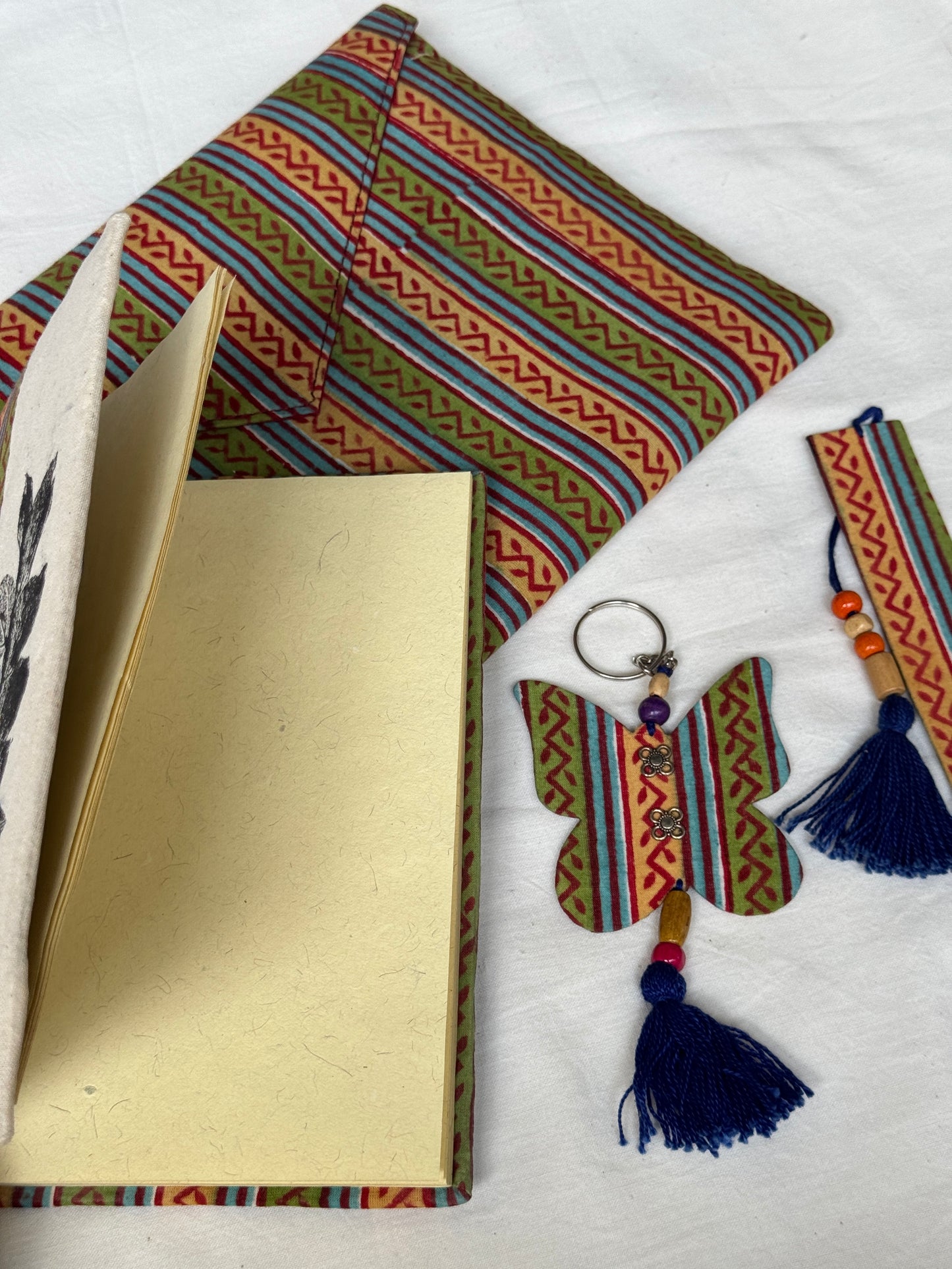 Handmade paper notebook with eco leaf printed fabric cover, hand crafted bookmark, key ring / charm and a container pouch set