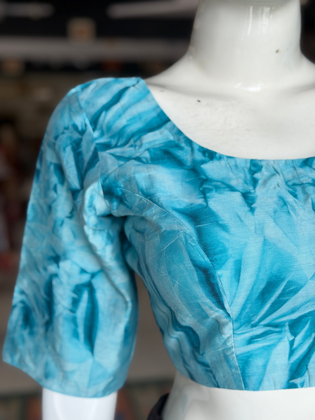 Blue crushed cotton back open blouse with elbow sleeves