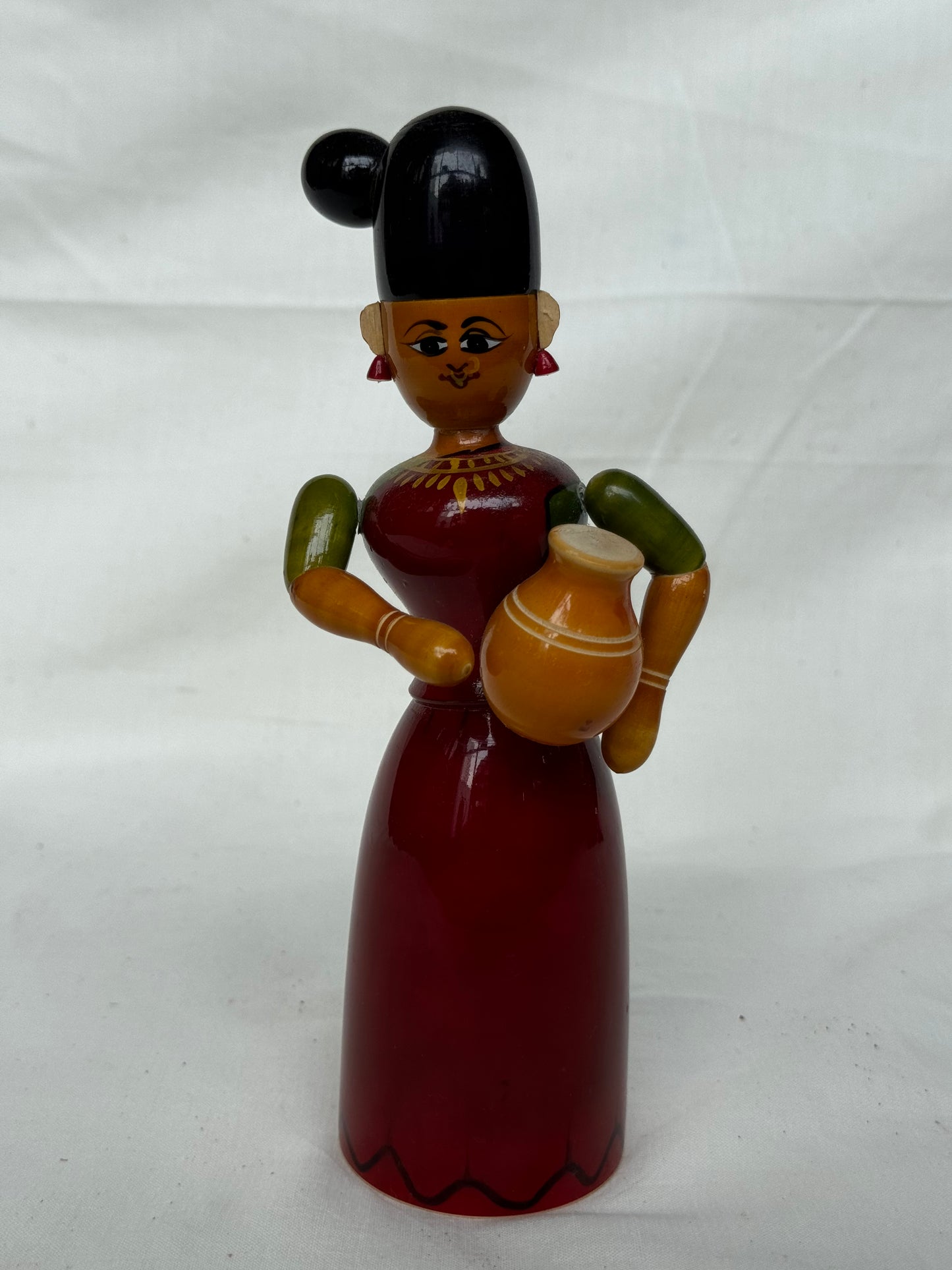 Lady with side bun and carrying pot - Etikoppaka Wooden handicraft decor