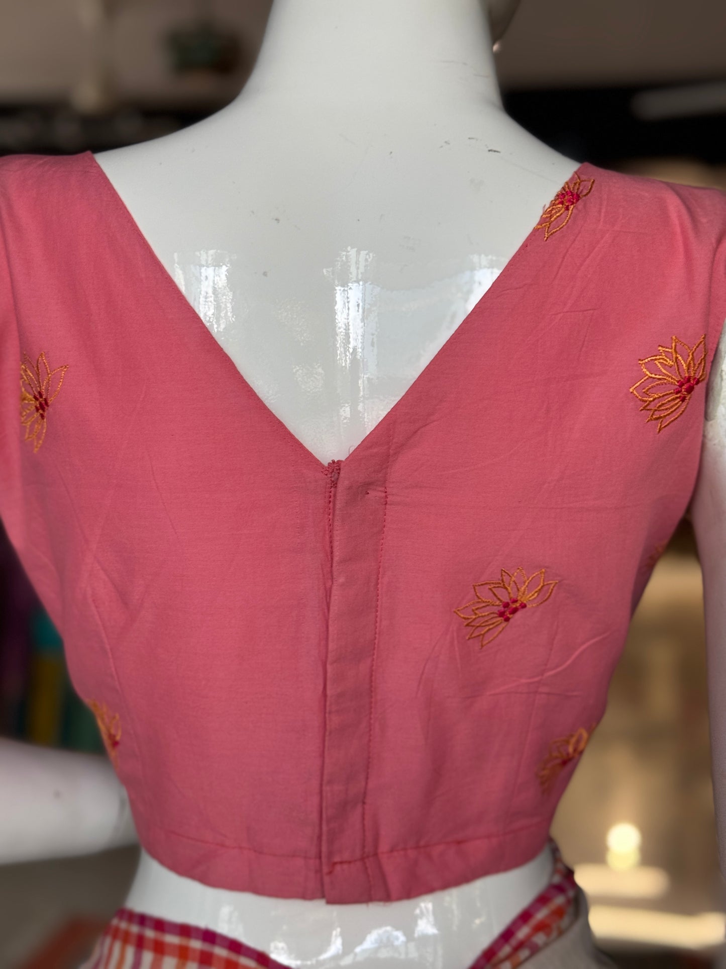 Pink cotton sleeveless blouse with floral machine embroidery - front boat neck, back v-neck