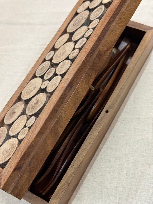 Wooden rectangular box with circles on top