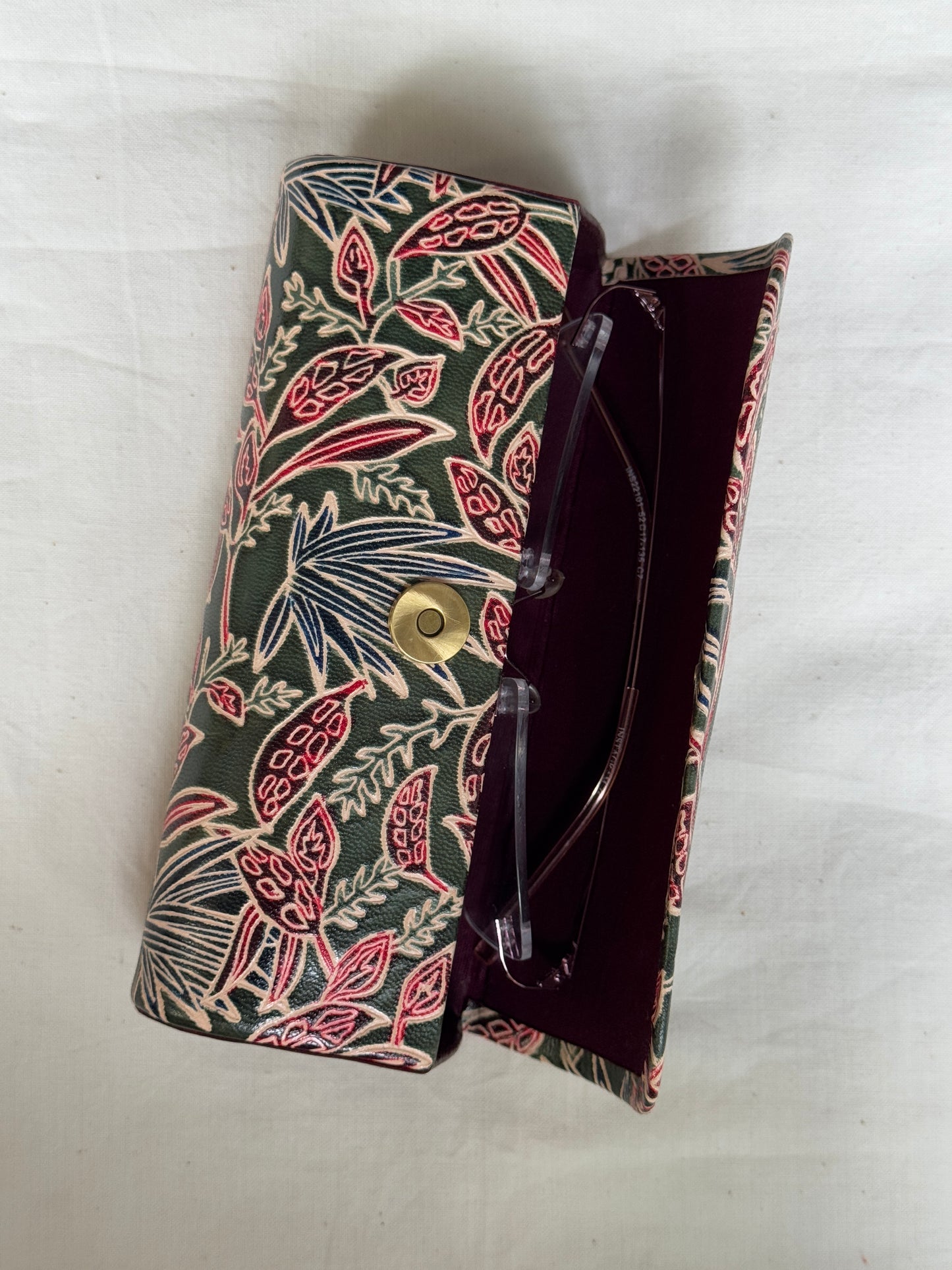 Hand embossed hand painted leather spectacles / goggles case