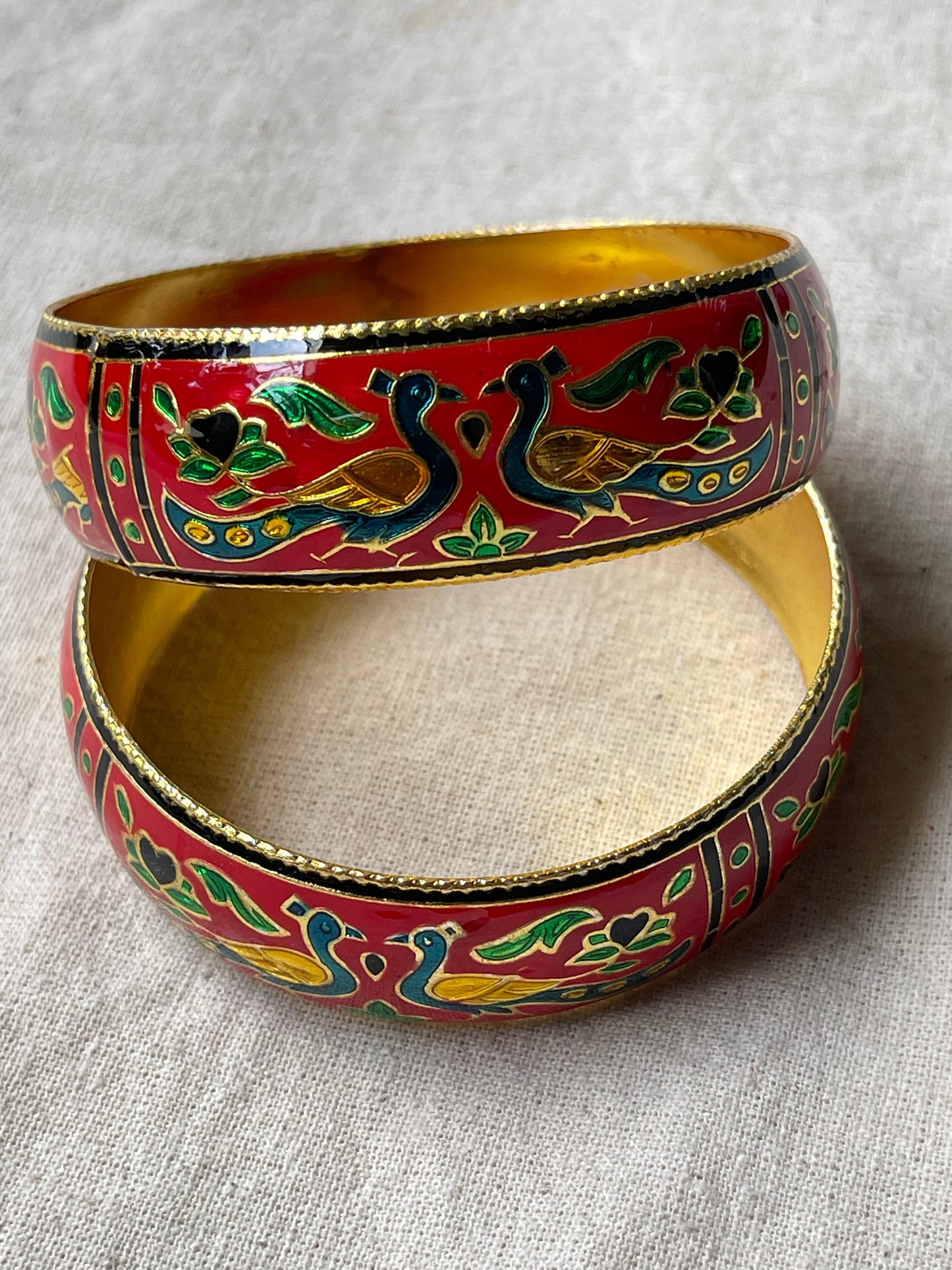 Lacquer enamel bangles pair with peacock motifs