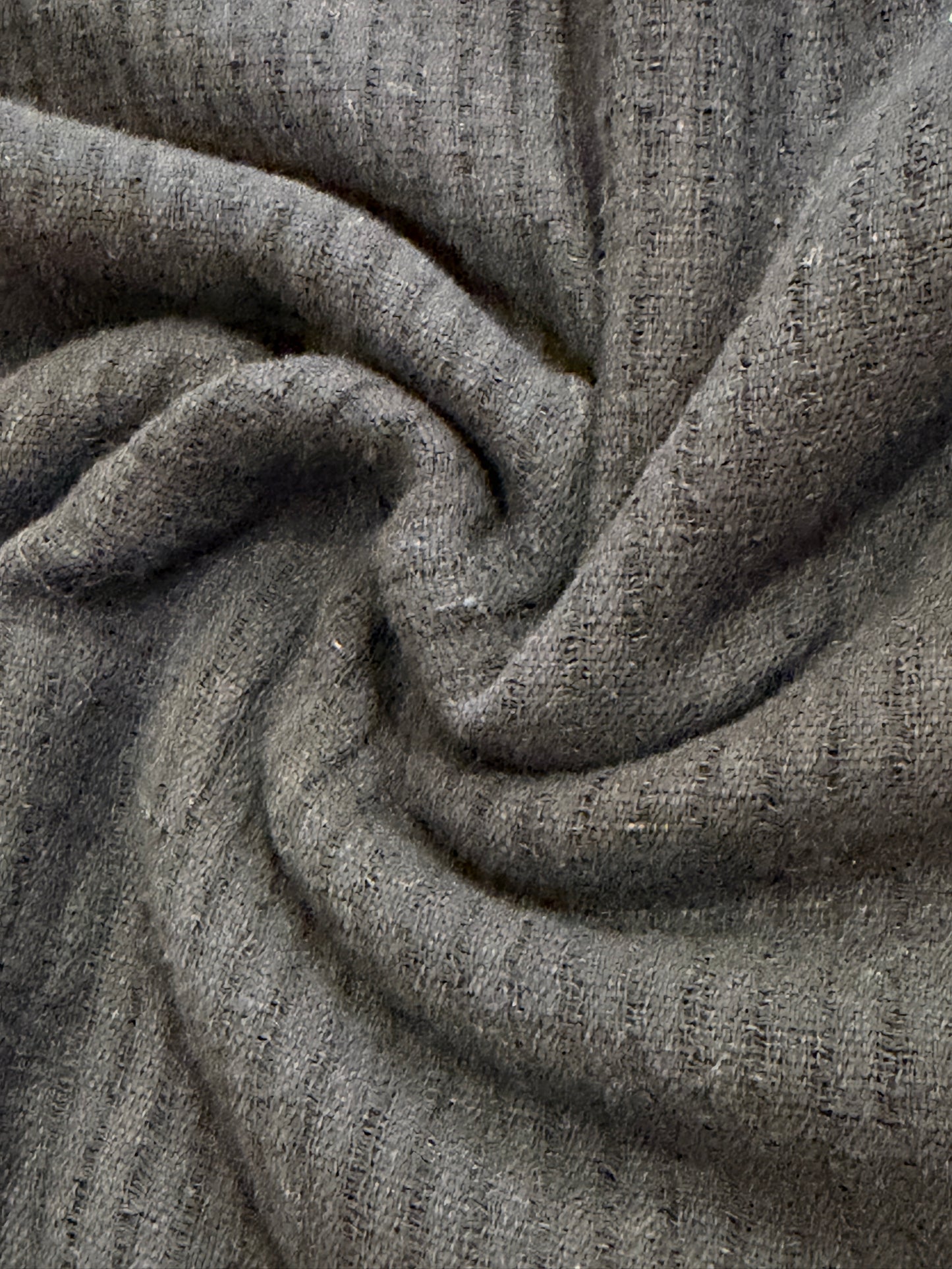 Black cotton hand spun, hand woven fabric with missing thread stripes weave