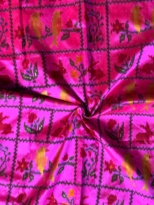 Hot pink pattu ikat silk handwoven fabric with rabbits, birds n flowers motif