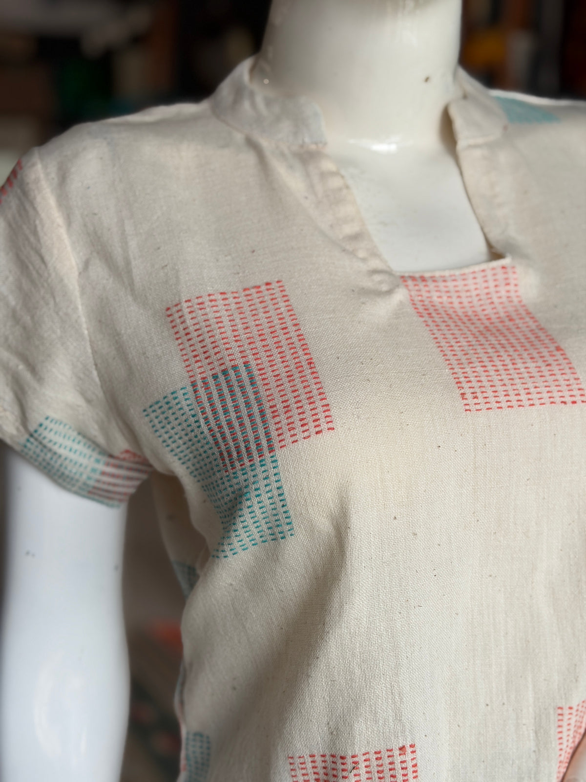 Off white hand woven cotton top with orange and teal woven squares