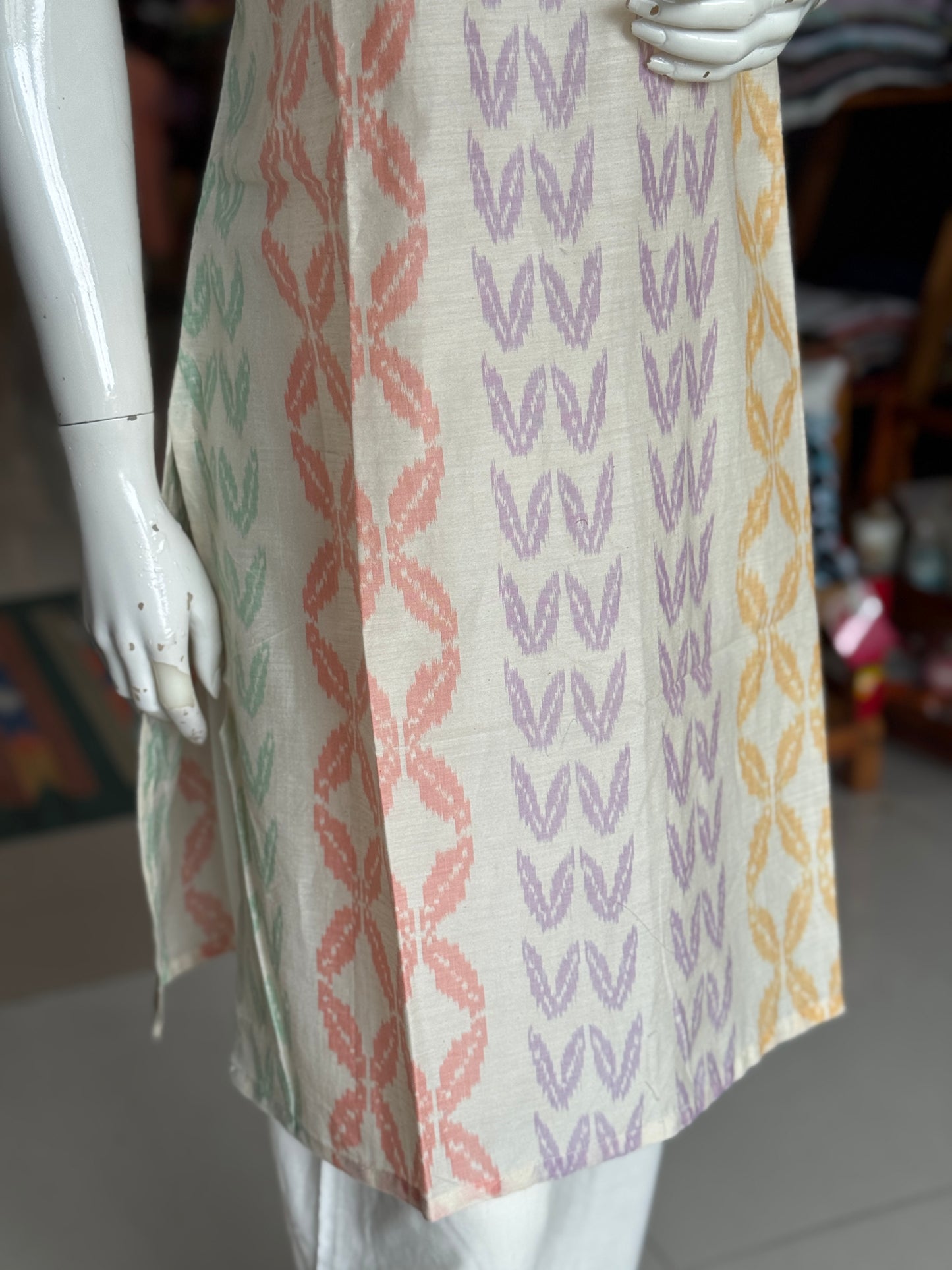 Off white handwoven silk ikat straight kurti with colorful vertical design