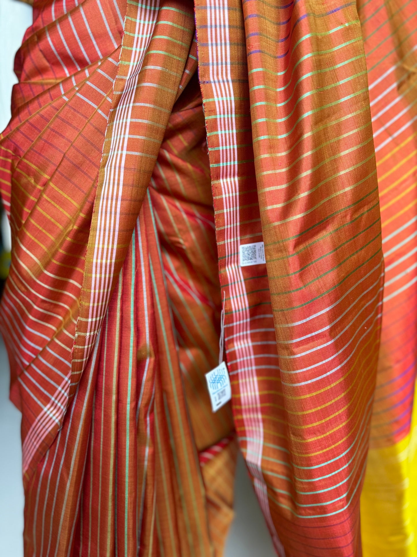 Orange pure silk handloom kanjeevaram pattu saree with multi colored stripes all over