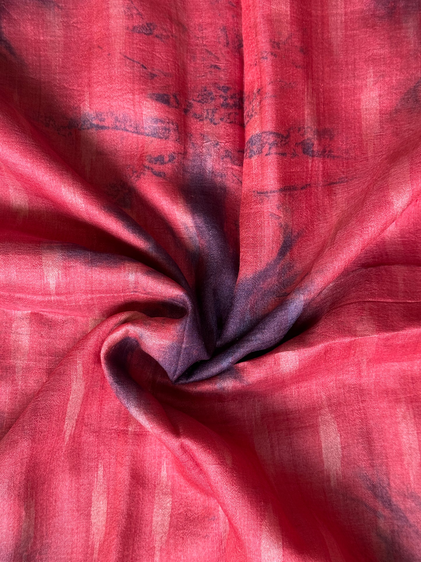 Red and purple thigh reeled tussar silk clamp dyed handwoven fabric
