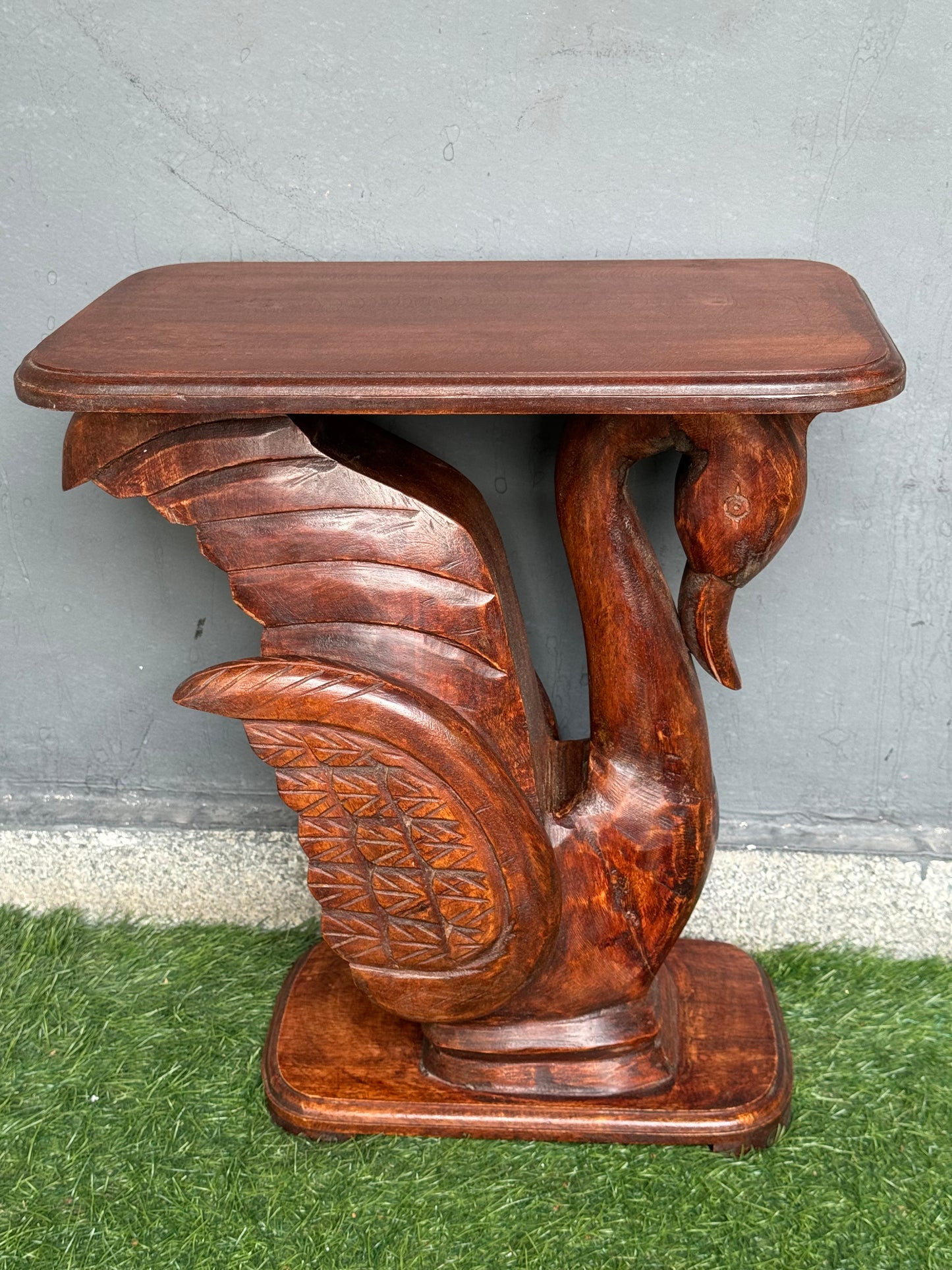 Wooden side / center table with carved swan base and flat top