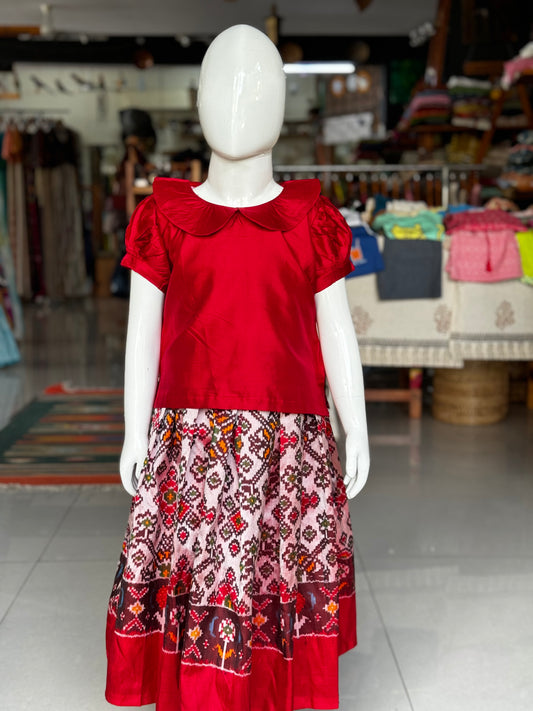 Light baby pink handwoven ikat pure silk lehenga (pattu langa) with red handloom pattu collared puff sleeves blouse set