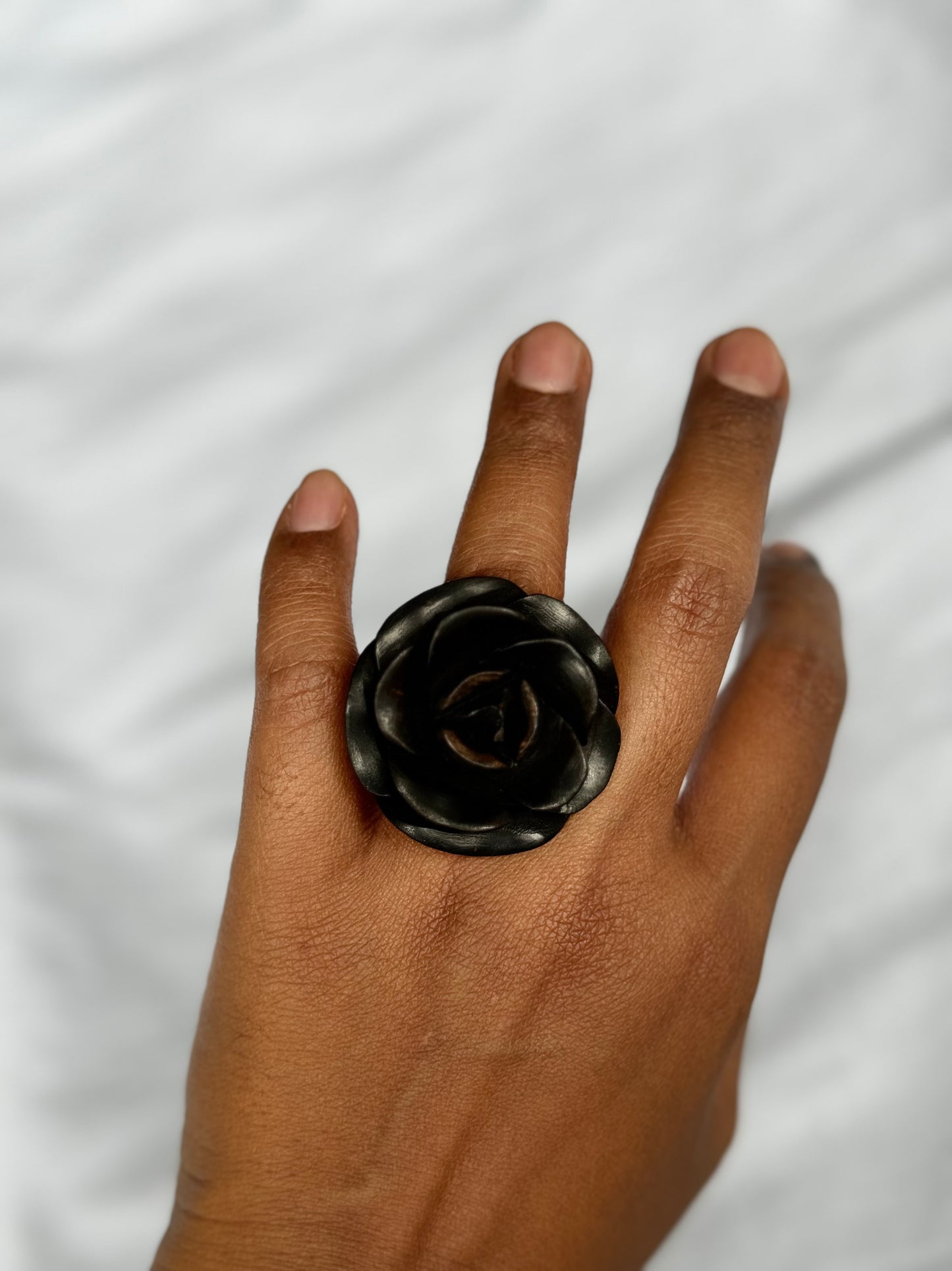 Rose hand carved finger ring in yellow wood