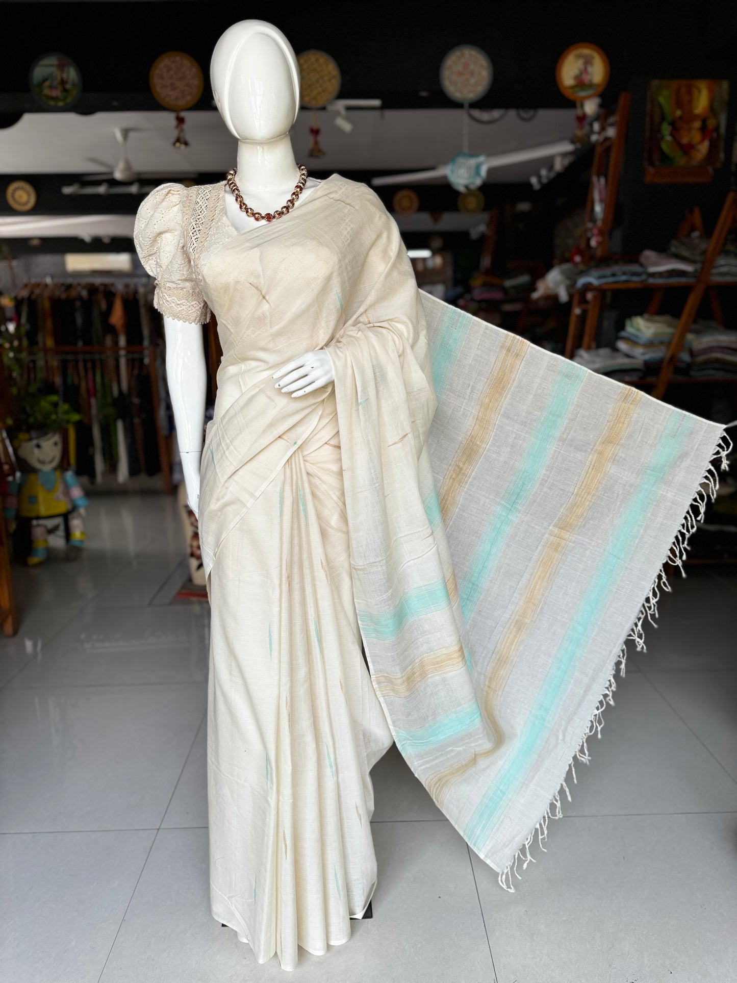 Offwhite pure soft cotton handloom saree with sea green and beige accents