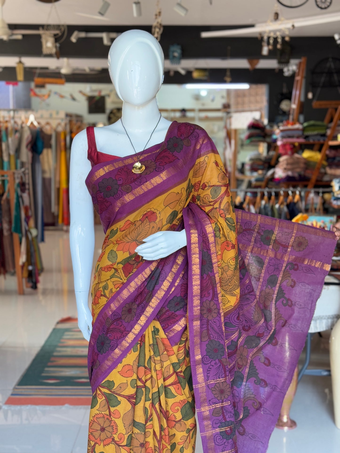 Mustard and purple floral design hand painted pen Kalamkari cotton saree