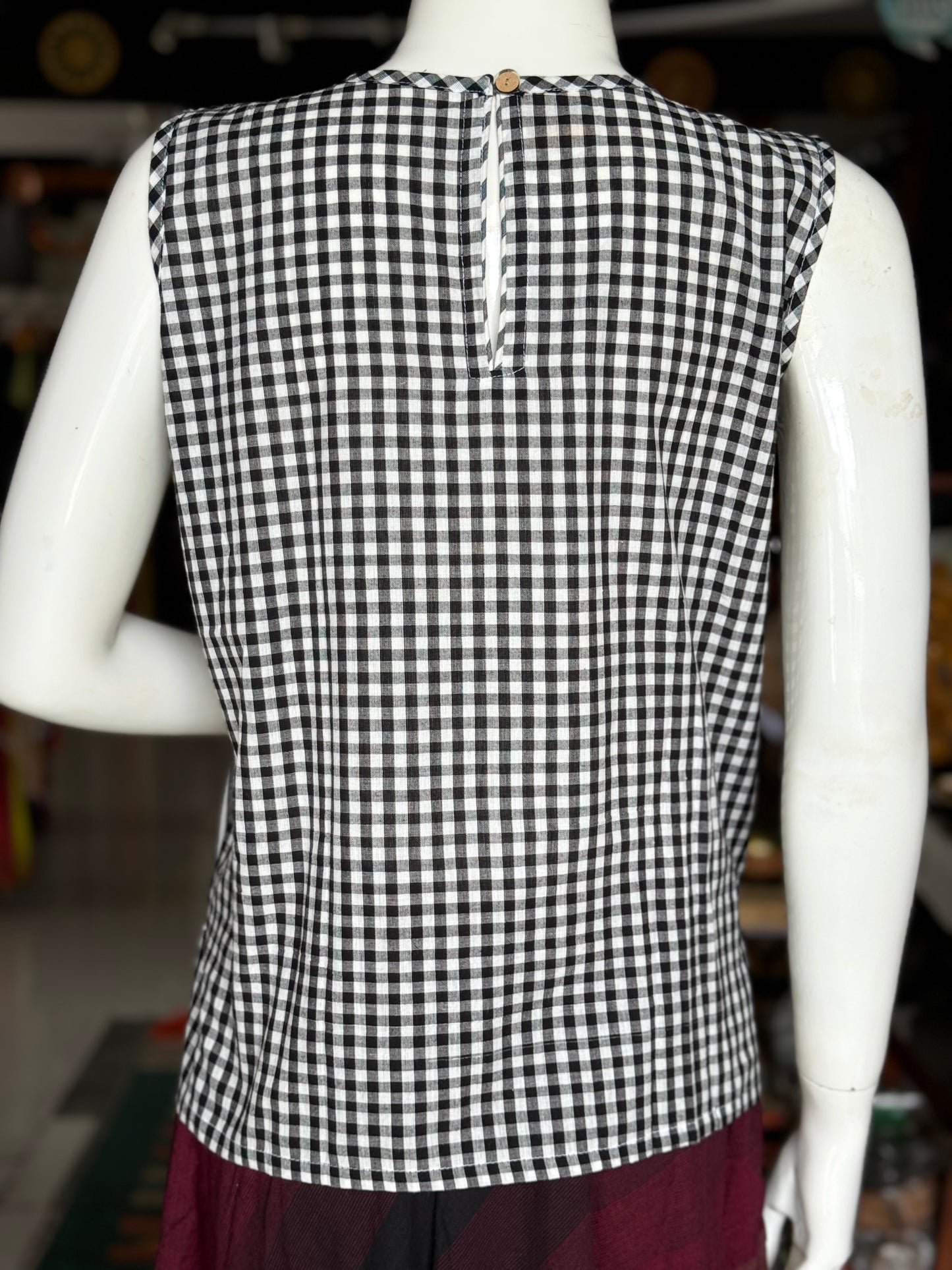 White and black cotton sleeveless top with stripes and checks pattern