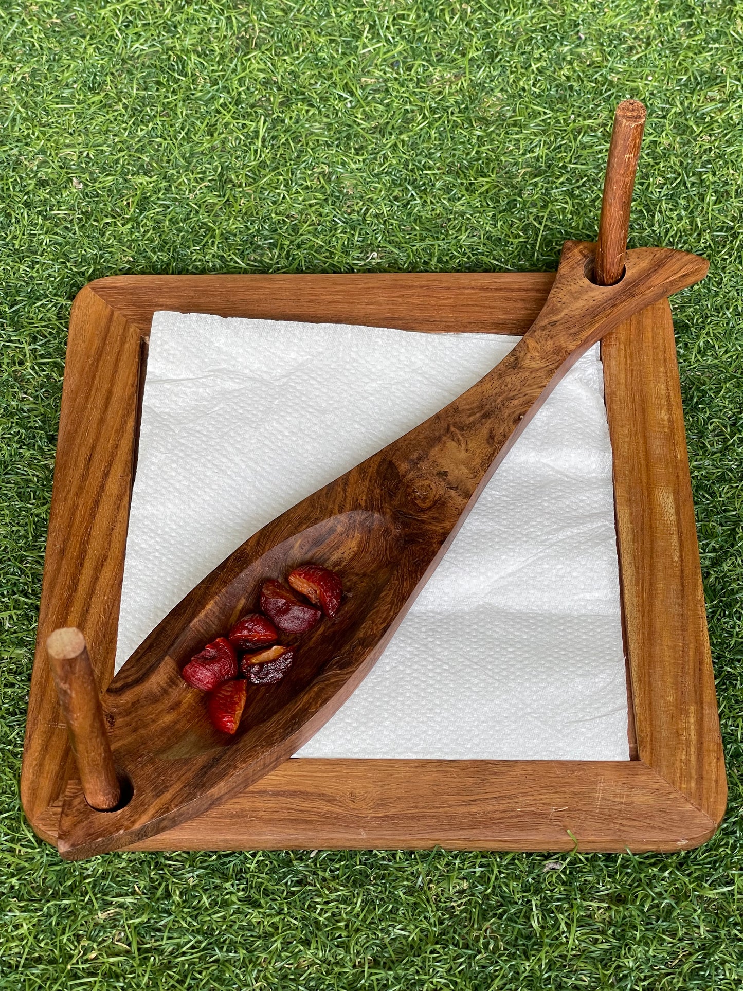 Wooden tissue holder with fish shaped stopper holder