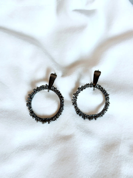 Black danglers beautifully crafted in brass with rhodium plating