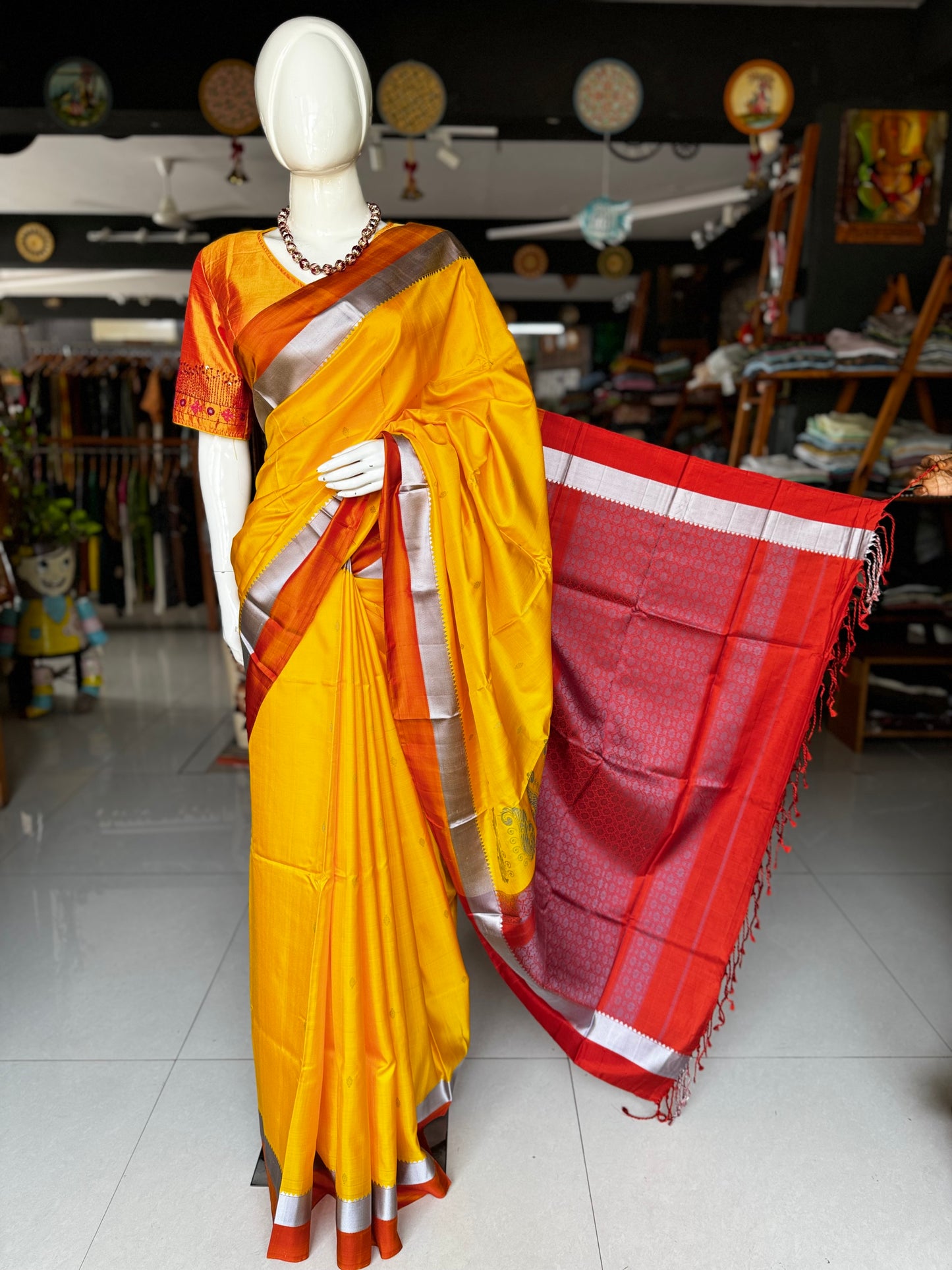 Haldi yellow pure silk Kodiyala handloom saree with all over gold butis and silver katan border