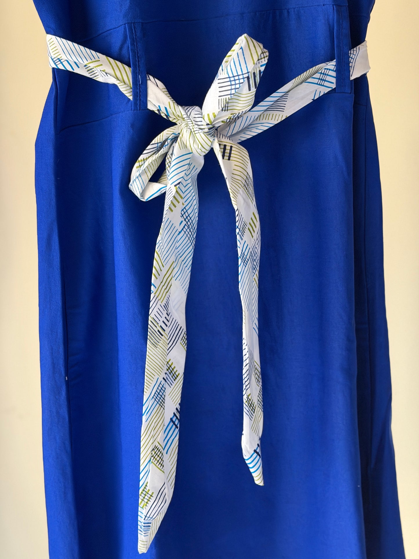 Royal blue sleeveless stretchable lycra dress with contrast white belt