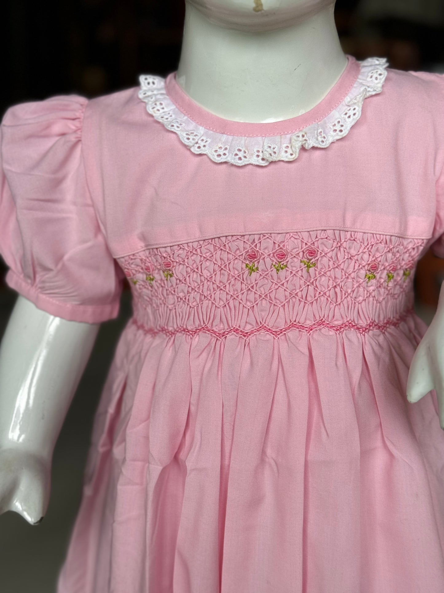 Pink smocking cotton frock with lace detailing and hand embroidery