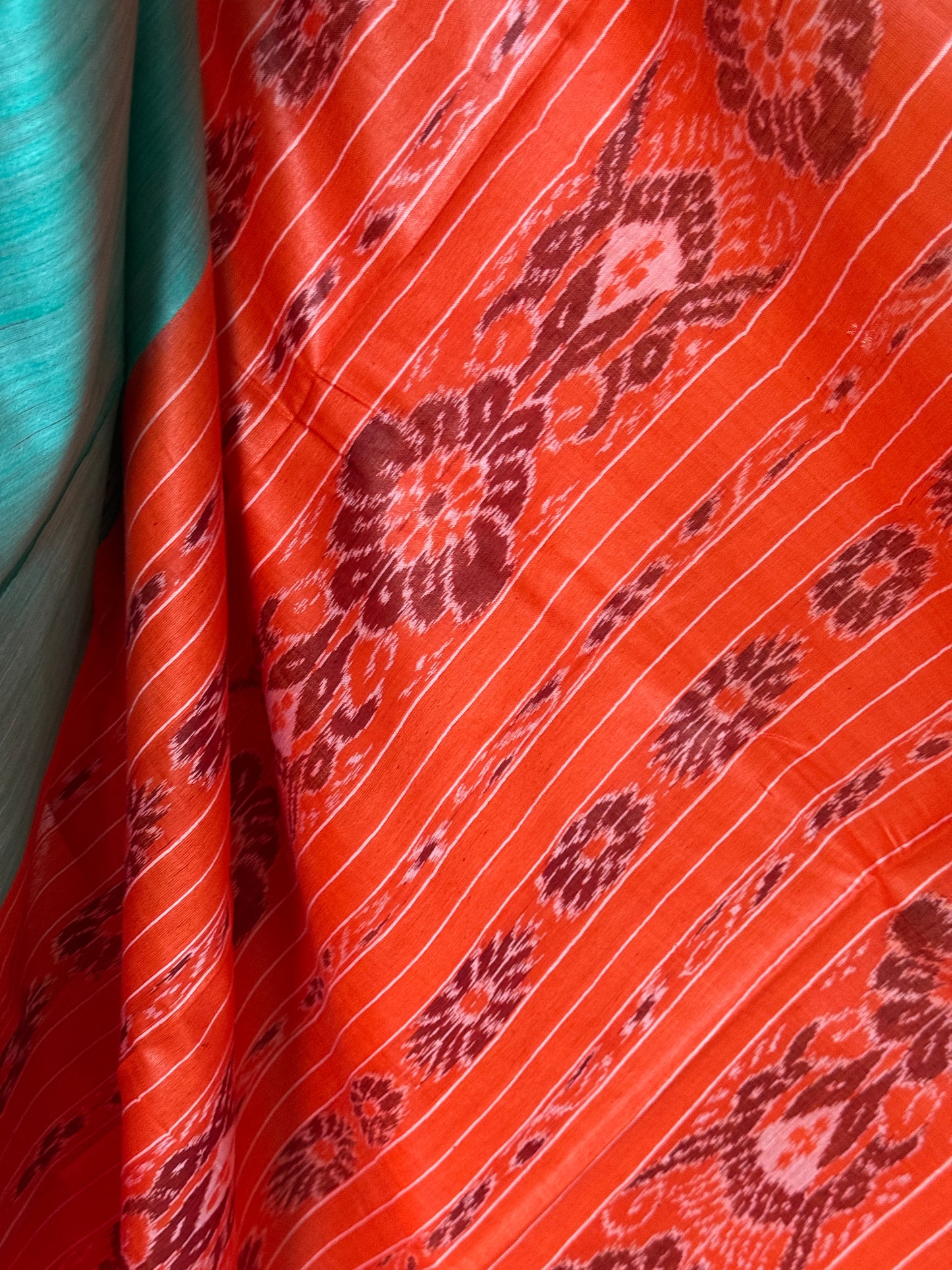 Sea green and orange tussar handwoven saree with ikat palla