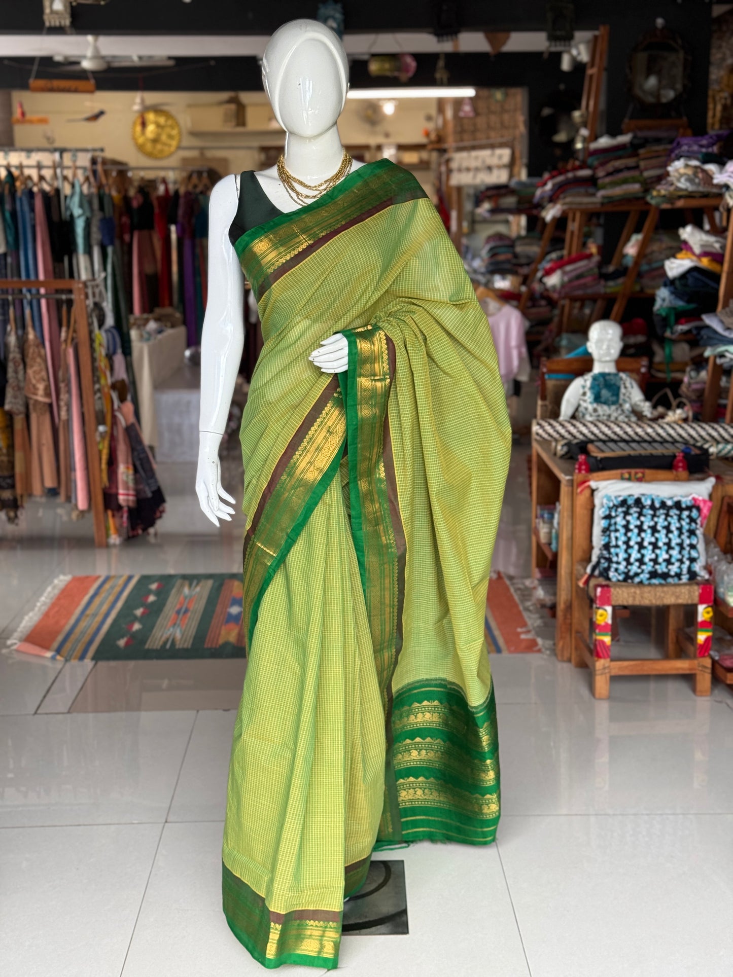 Gadwal cottons - green handwoven Gadwal cotton saree with silk Pallu and borders