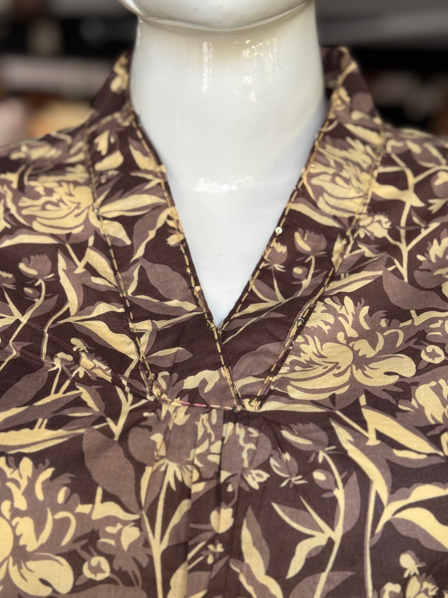 Cotton floral print short top with handwork detailing around neck