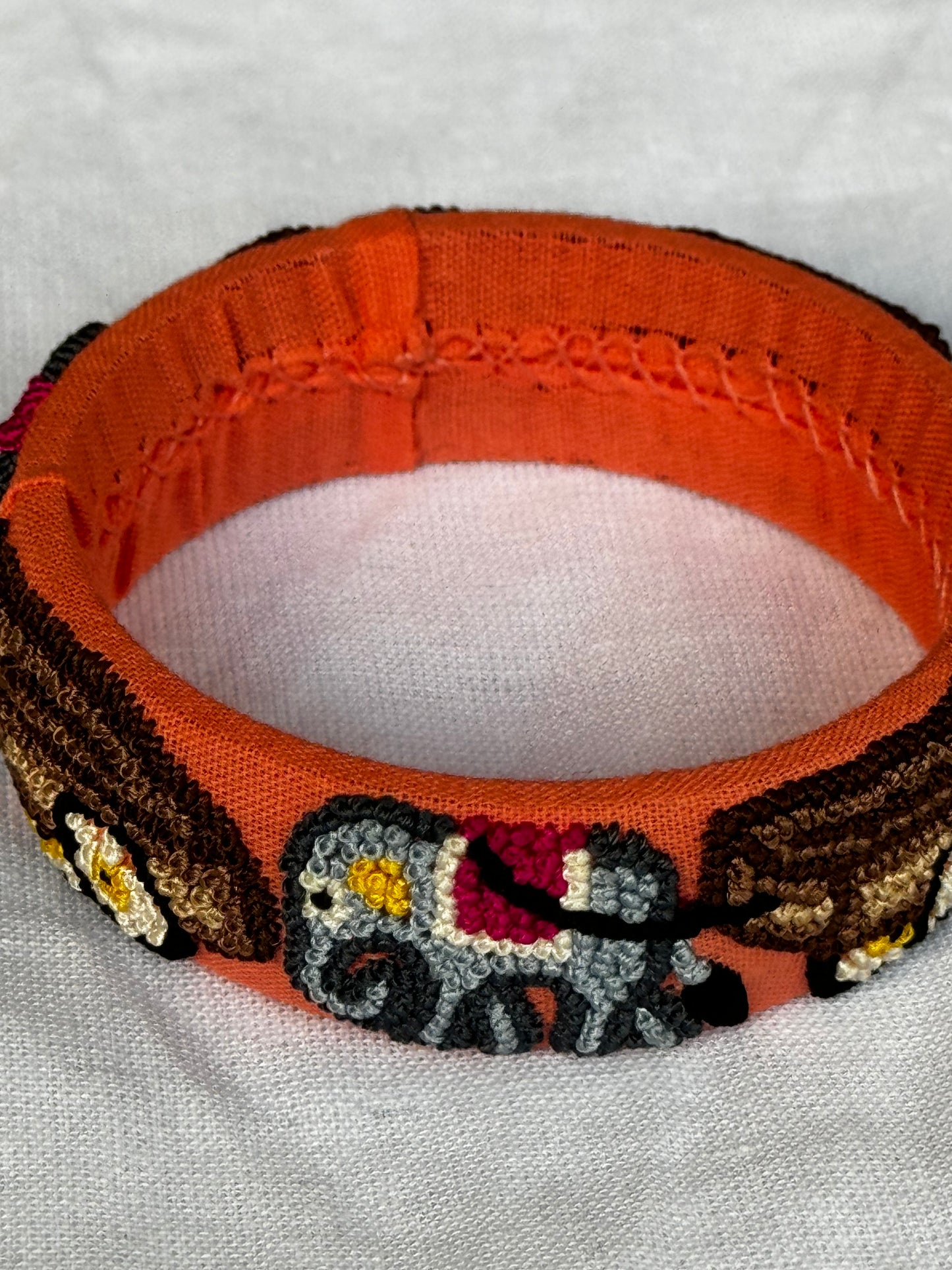 Orange french knot elephants hand embroidered bangle - single