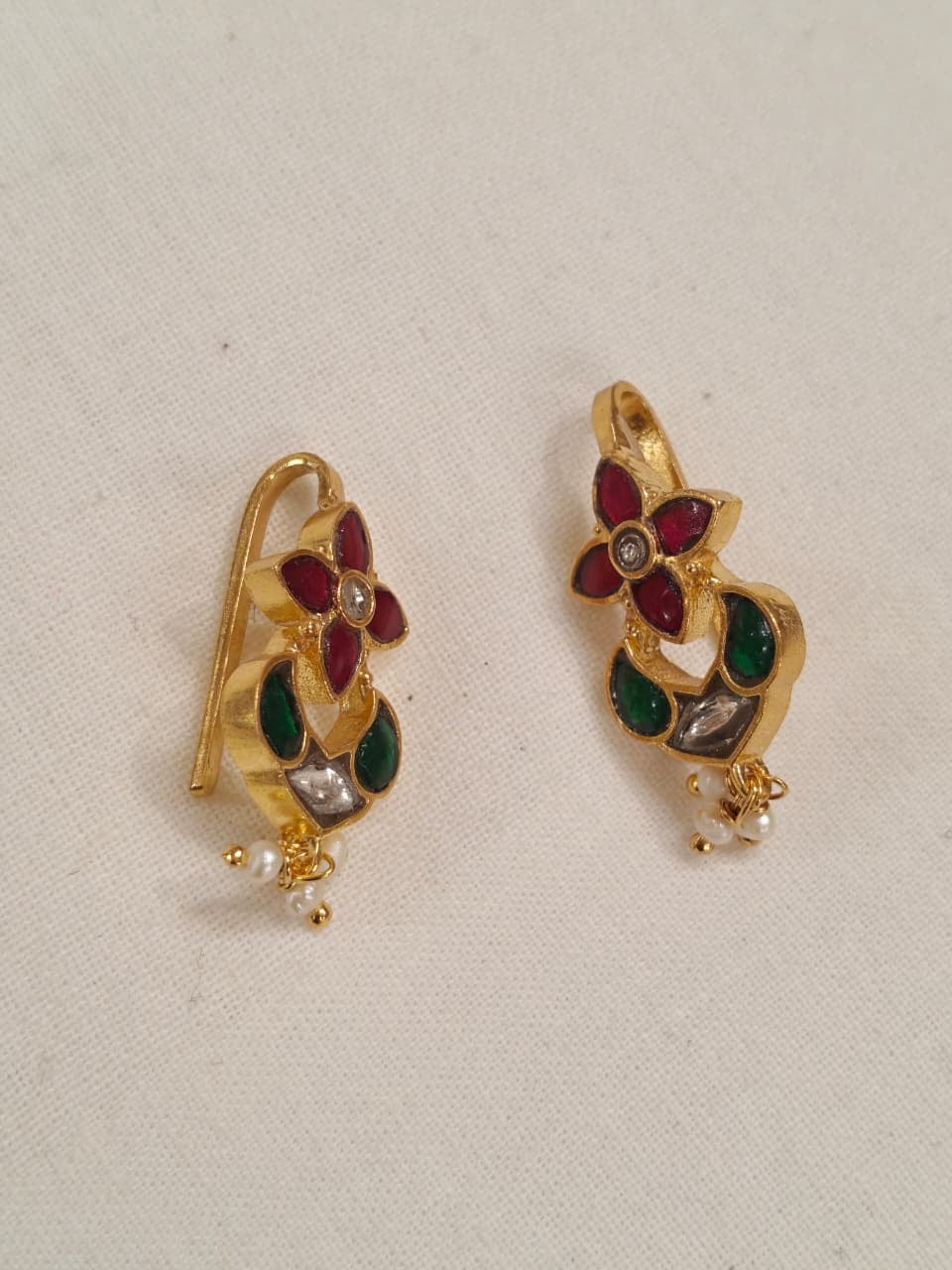 Four petal flower shaped silver ear clip ons in Pink and green stones