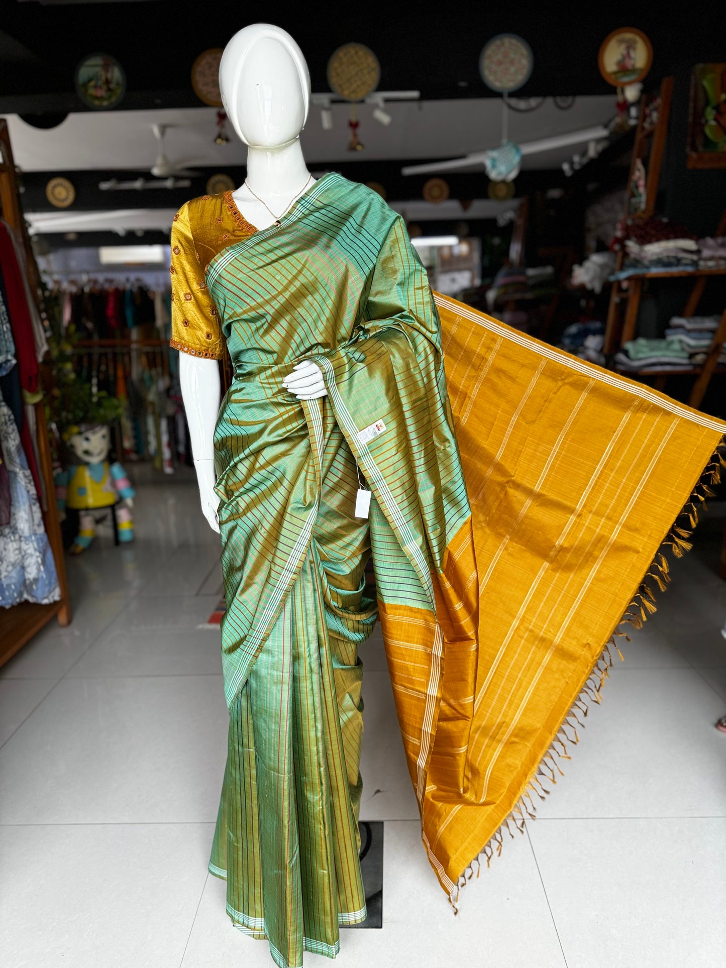 Green pure silk handloom kanjeevaram pattu saree with multi colored stripes all over