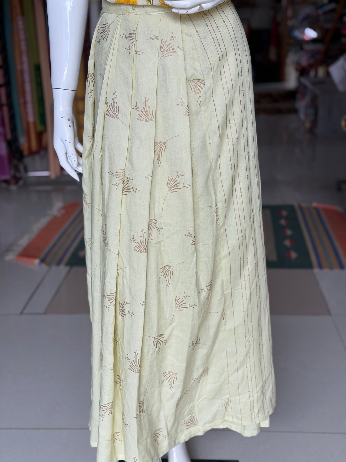 Light yellow wrap around skirt with plain and pleated panels - free size