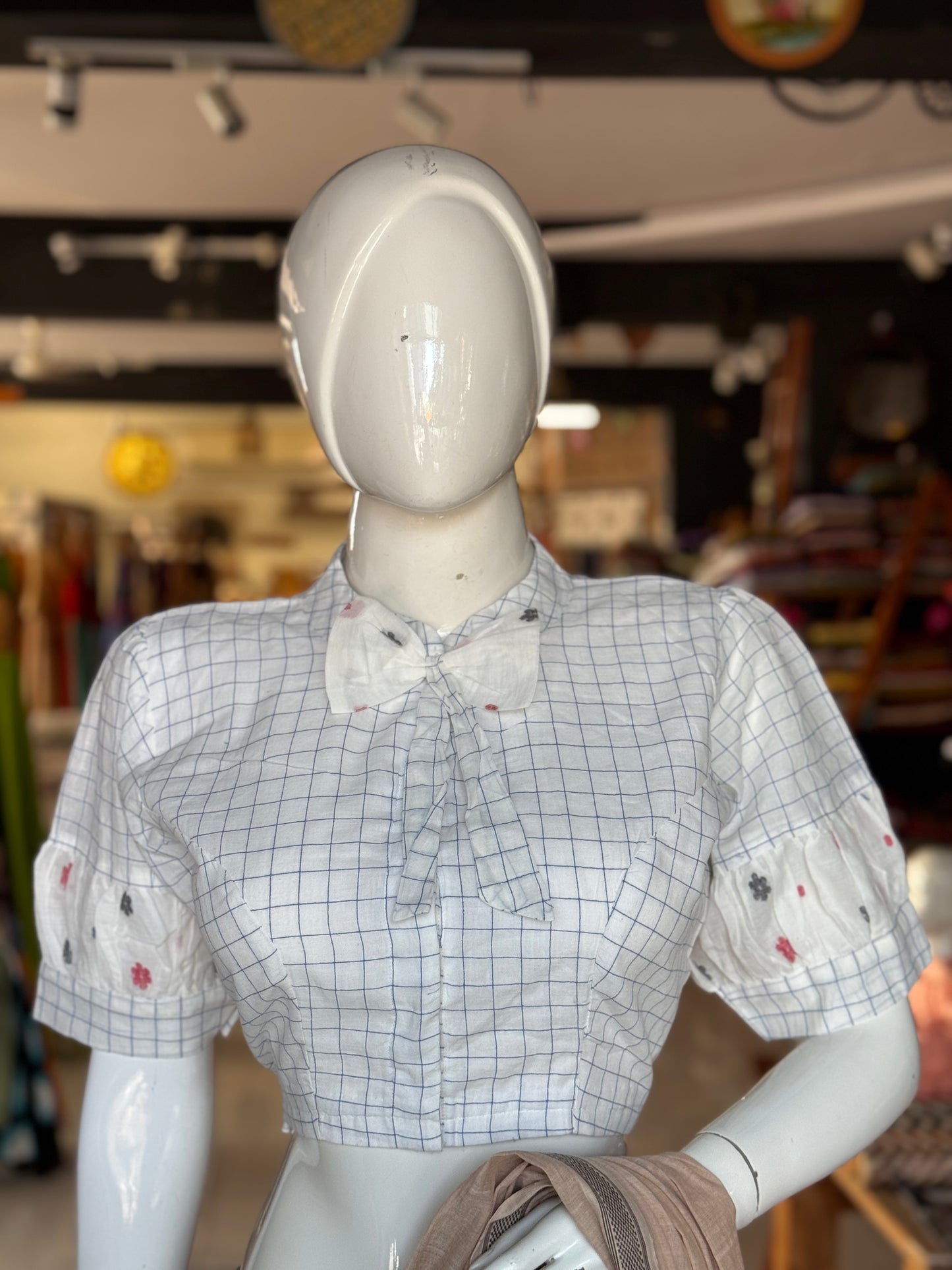 White n blue checks hand woven cotton Jamdani blouse with elbow length balloon sleeves and bow neck