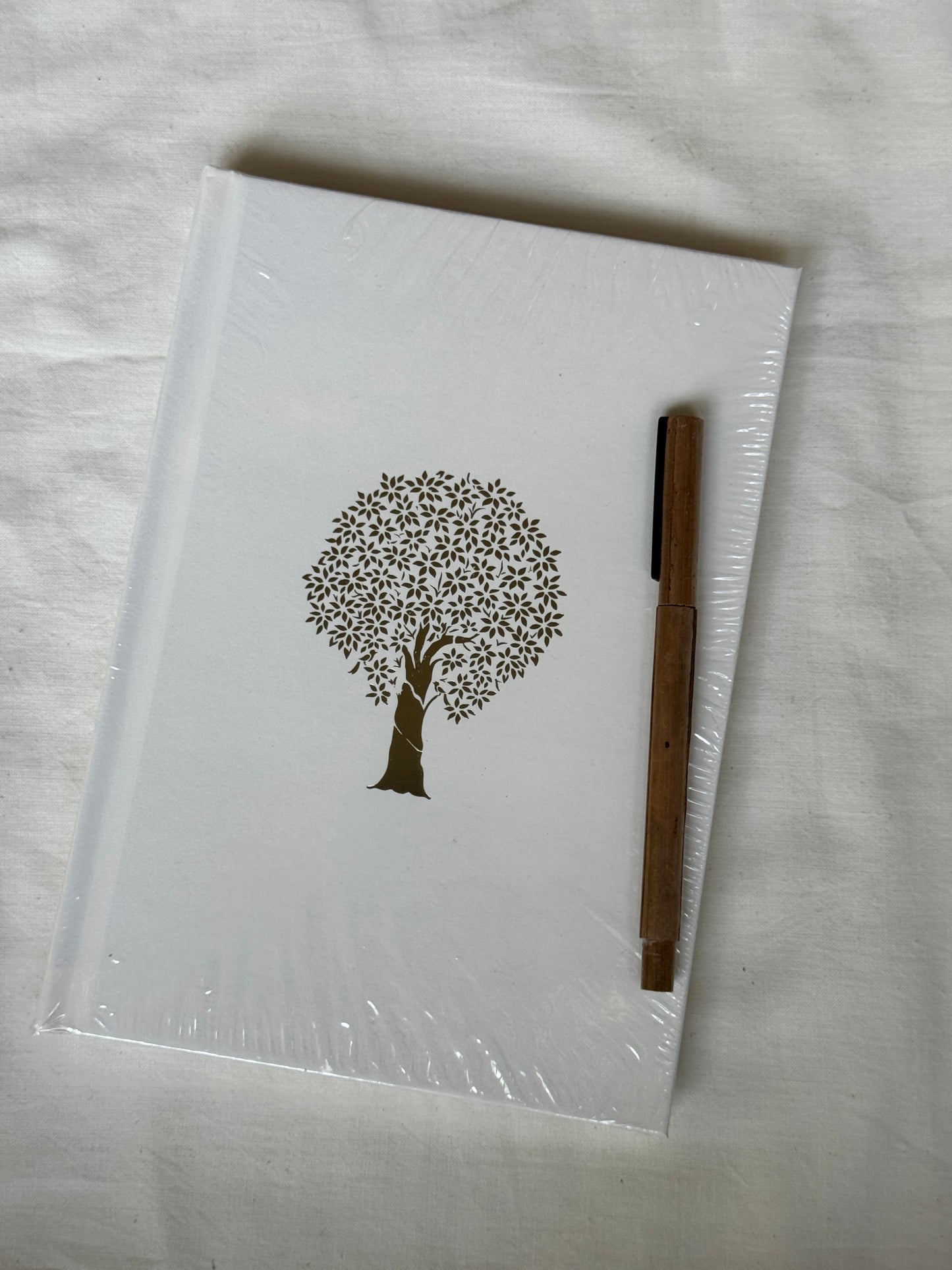 Ruled paper notebook journal / diary with gold foiled cover and  handwoven pouch