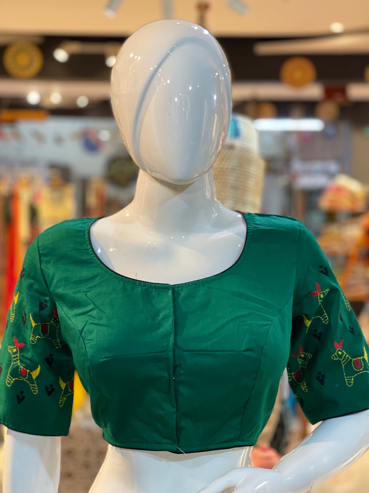 Green cotton hand embroidered kantha work blouse with lace and animals embroidery on back